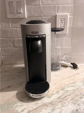 Nespresso Silver and Black De'Longhi Capsule Espresso Machine